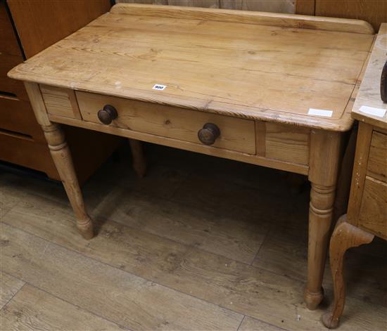A pine side table W.99cm